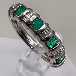 Emerald ring with diamonds